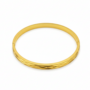 Classic Diamond-Cut Gold Bangle - Angled View Showing Lustrous Finish
