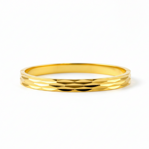 Classic Diamond-Cut Gold Bangle - Side View with Geometric Pattern
