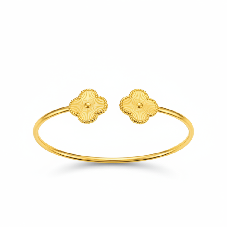 Golden Clover Bangle top view showing circular open cuff design and radiating line pattern