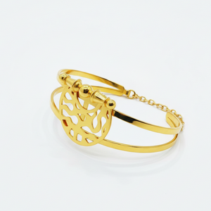 Heritage Dome Bracelet close-up detail showing intricate Islamic-inspired geometric cutout pattern and gold finish