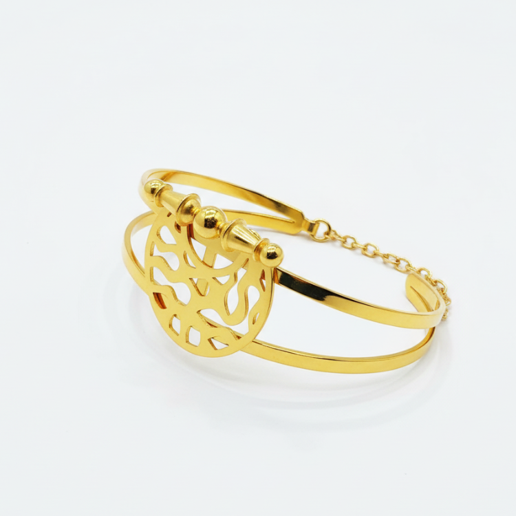 Heritage Dome Bracelet close-up detail showing intricate Islamic-inspired geometric cutout pattern and gold finish