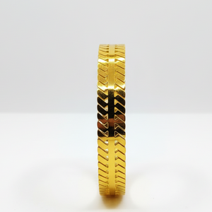 Close-up Detail of 24K Gold Track Bracelet Geometric Pattern