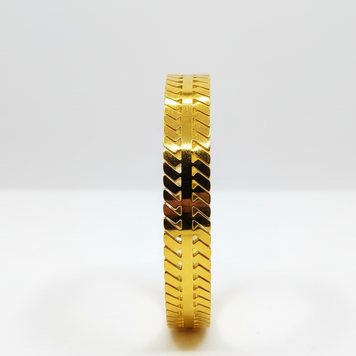 Close-up Detail of 24K Gold Track Bracelet Geometric Pattern