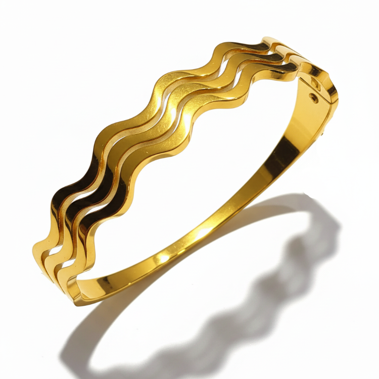 Golden wavy bangle bracelet with clasp closure - premium jewelry by OSHAS