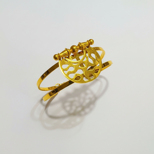 Heritage Dome Bracelet front view - 24K gold plated bangle with circular medallion and delicate chain accent, centered composition
